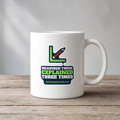 Mockup: Measured Twice, Explained Three Times on a white mug