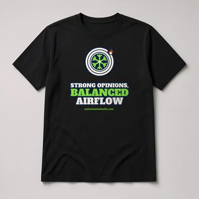 Mockup: Strong Opinions, Balanced Airflow on a black T-shirt